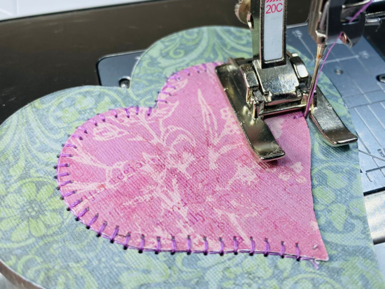 stitching paper hearts